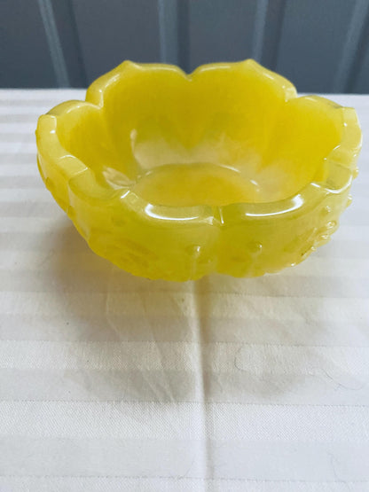 Small hand-crafted decorative resin bowl in yellow