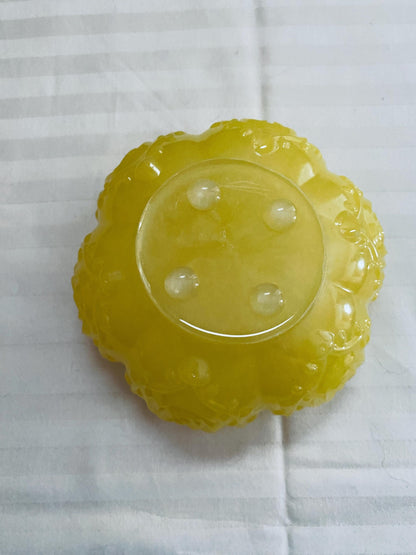 Small hand-crafted decorative resin bowl in yellow