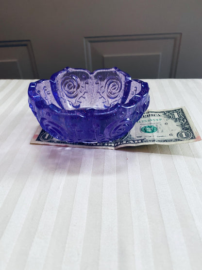 Small handmade decorative resin bowl in purple