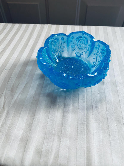 Small handmade decorative resin bowl in teal
