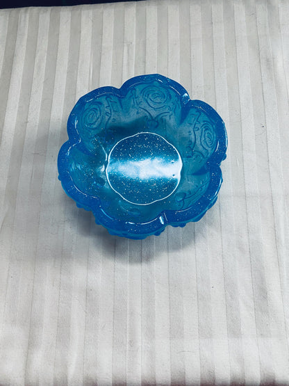 Small handmade decorative resin bowl in teal