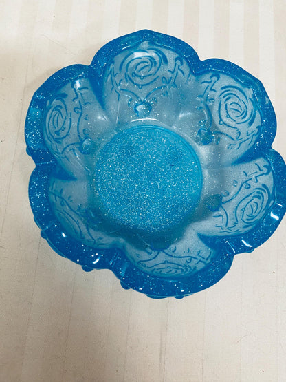 Small handmade decorative resin bowl in teal