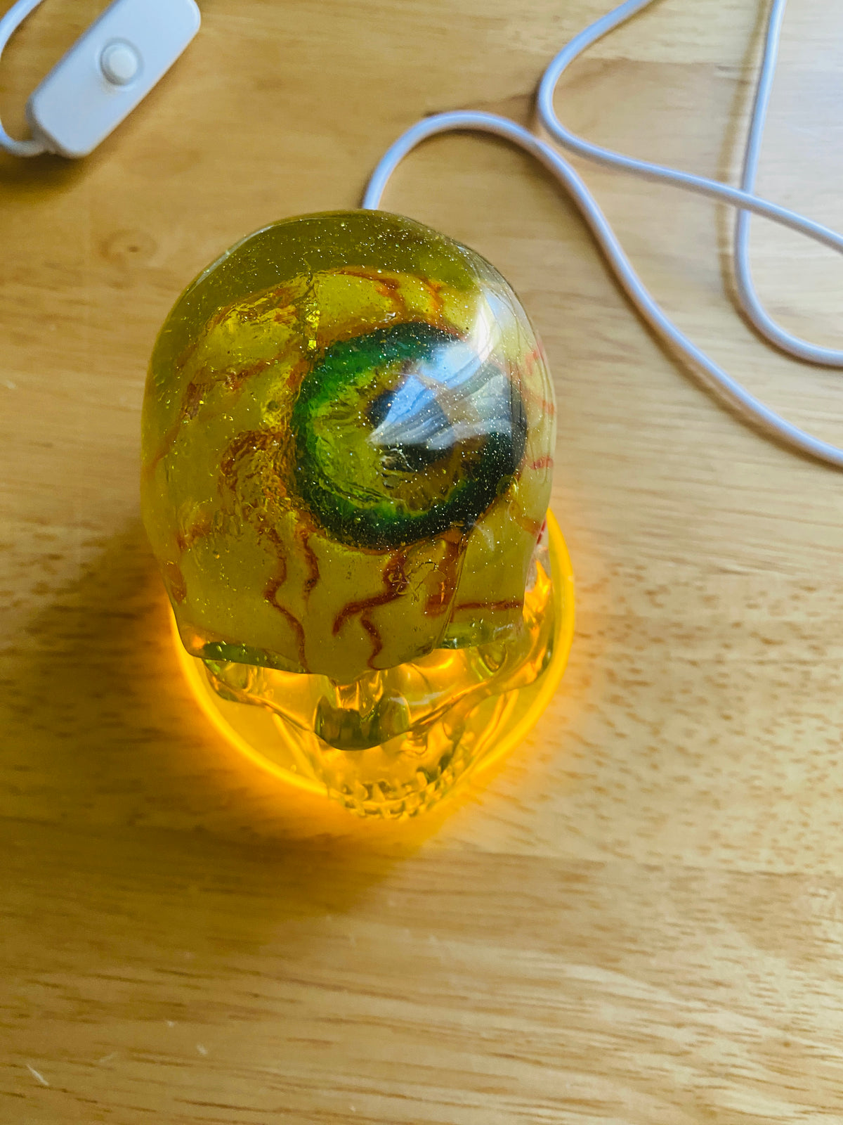 Skull with Large Eyeball and Lighted base