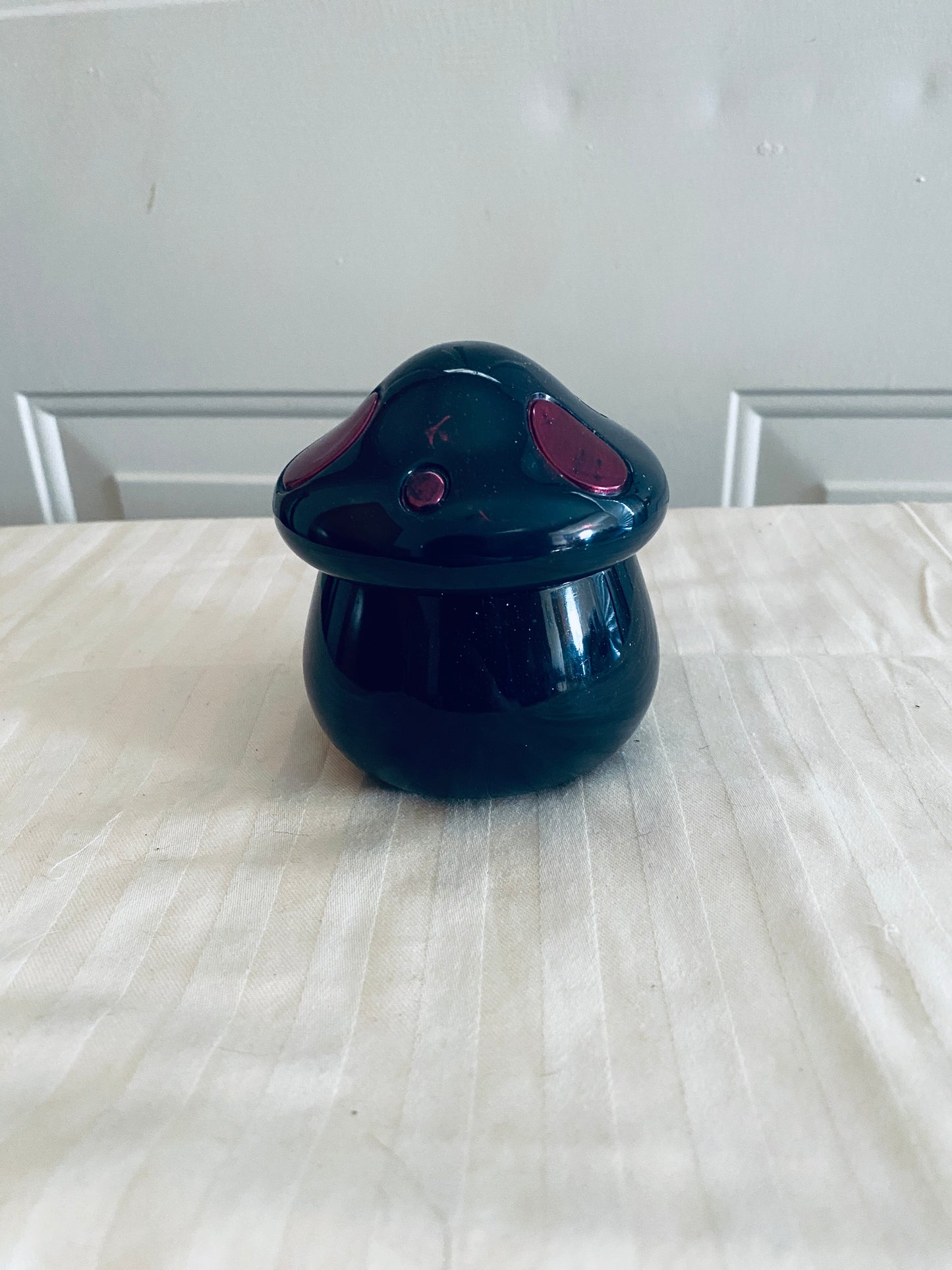 Navy and Pink mushroom-shaped pot with lid.