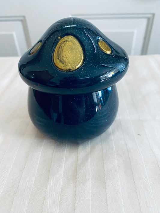 Black and Gold mushroom-shaped pot with lid.
