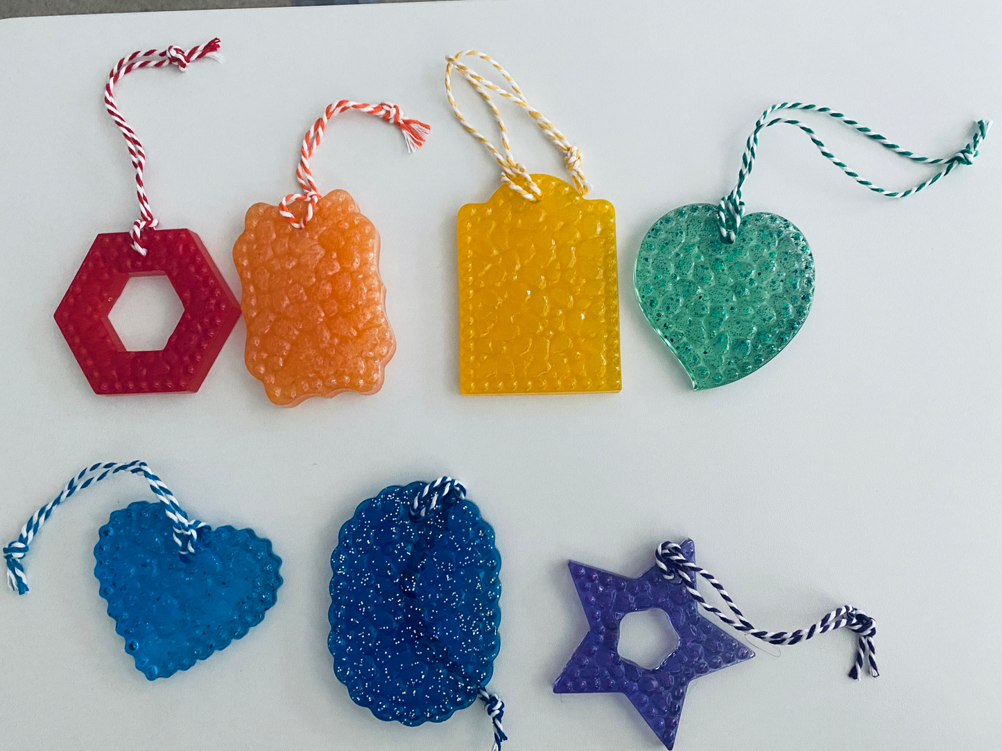 set of seven hand-poured textured resin ornaments in rainbow colors (1)