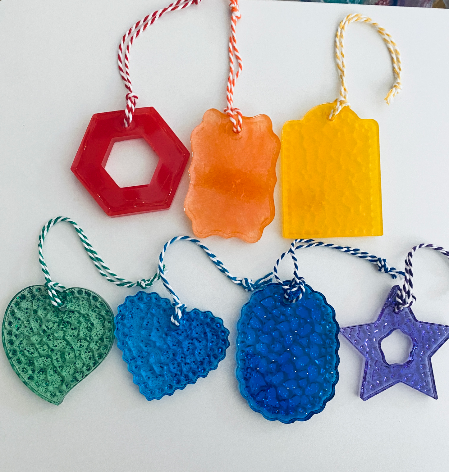 set of seven hand-poured textured resin ornaments in rainbow colors (1)