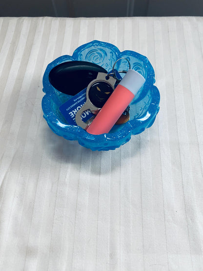 Small handmade decorative resin bowl in teal