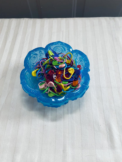 Small handmade decorative resin bowl in teal